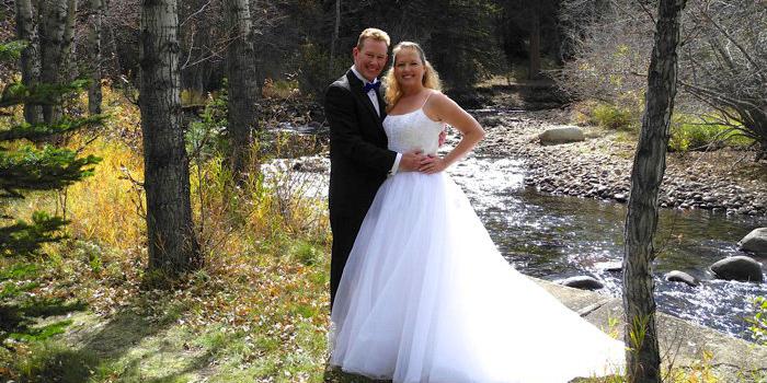 Romantic RiverSong Weddings weddings in Estes Park CO